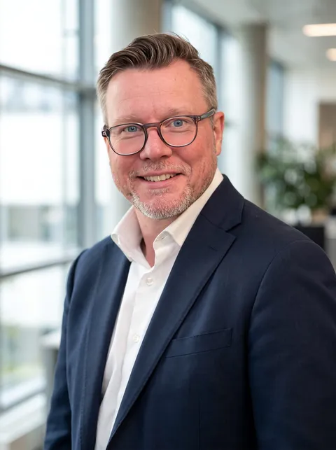 Portrait of Dr Neil Clelland, Co-founder & CBO at QuberTech